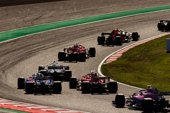 Max Verstappen, Red Bull Racing RB14, leads Kimi Raikkonen, Ferrari SF71H, Romain Grosjean, Haas F1 Team VF-18, Sebastian Vettel, Ferrari SF71H, Pierre Gasly, Scuderia Toro Rosso STR13, and Brendon Hartley, Toro Rosso STR13, at the start