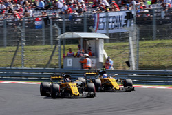 Nico Hulkenberg, Renault Sport F1 Team RS17 passes Jolyon Palmer, Renault Sport F1 Team RS17