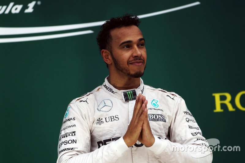 Race winner Lewis Hamilton, Mercedes AMG F1 celebrates on the podium