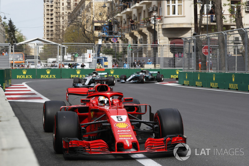 Sebastian Vettel, Ferrari SF71H, leads at the start of the race