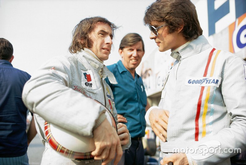 Jackie Stewart talks with team mate Francois Cevert and team boss Ken Tyrrell.