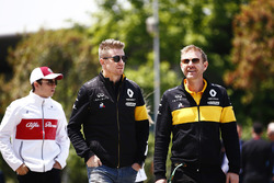 Nico Hulkenberg, Renault Sport F1 Team, walks into the track ahead of Charles Leclerc, Sauber