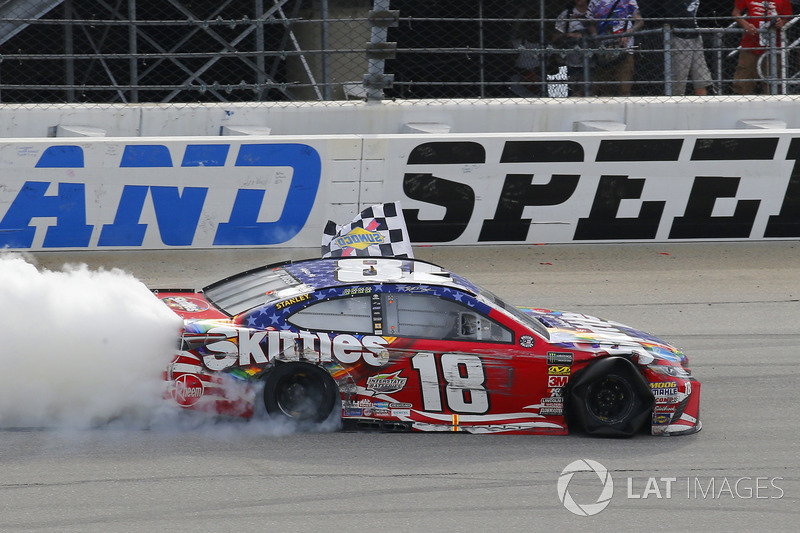 Kyle Busch, Joe Gibbs Racing, Toyota Camry Skittles Red White & Blue celebrates his win with a burnout