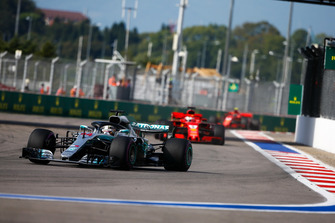 Lewis Hamilton, Mercedes AMG F1 W09, leads Sebastian Vettel, Ferrari SF71H