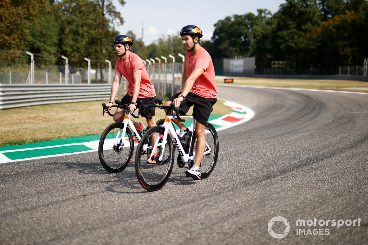 Max Verstappen, Red Bull Racing RB16B Sergio Perez, Red Bull Racing RB16B track walk on bicycles