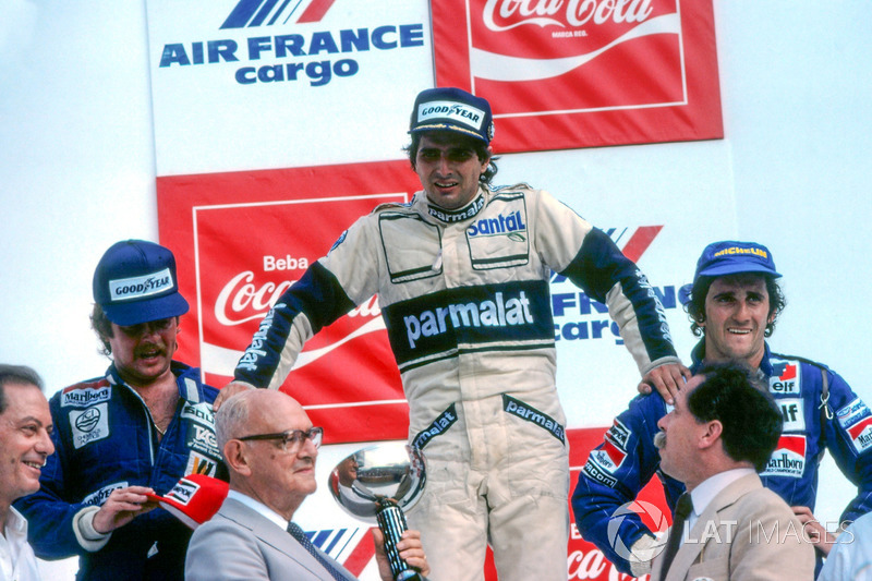 Podium: race winner Nelson Piquet, Brabham, second place Keke Rosberg, Williams, third place Alain P