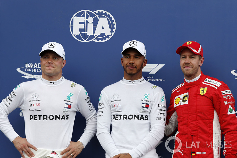 Valtteri Bottas, Mercedes-AMG F1, Lewis Hamilton, Mercedes-AMG F1 e Sebastian Vettel, Ferrari, nel parco chiuso