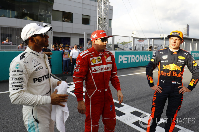 The top-three qualifiers. Pole winner Lewis Hamilton, Mercedes AMG F1, Kimi Raikkonen, Ferrari, Max 