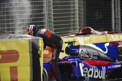 Daniil Kvyat, Scuderia Toro Rosso, climbs out of his car after crashing out