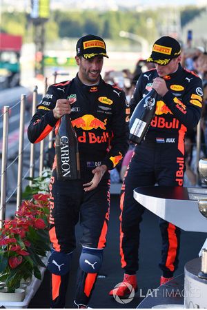 Daniel Ricciardo, Red Bull Racing and Max Verstappen, Red Bull Racing celebrate on the podium with the champagne