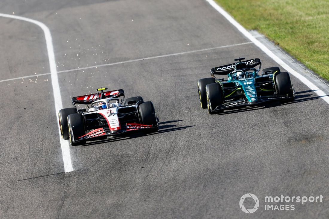 Nico Hulkenberg, Haas VF-23, lucha con Lance Stroll, Aston Martin AMR23