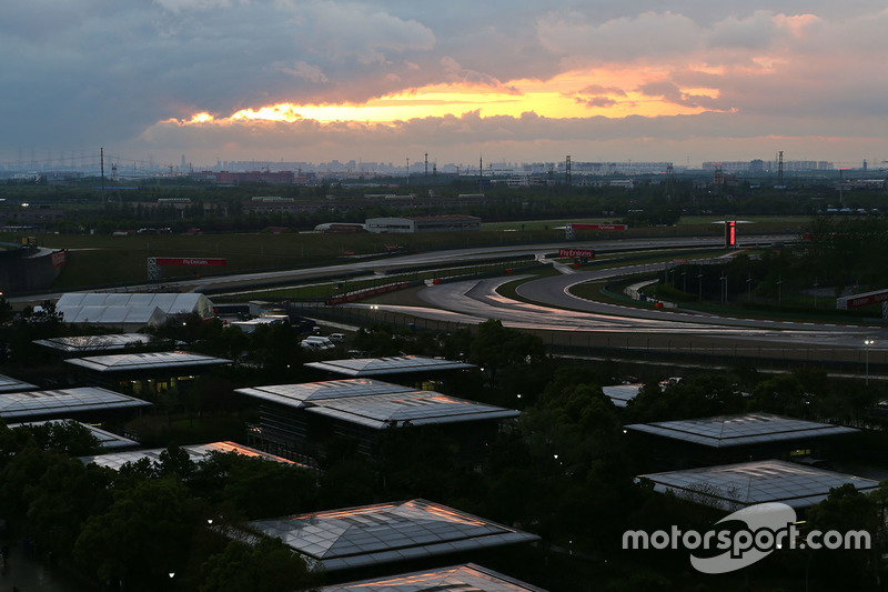 The sun rises over the circuit