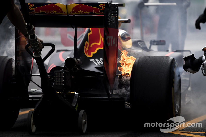 1. The brakes of Max Verstappen, Red Bull Racing RB12, catch fire in the pits