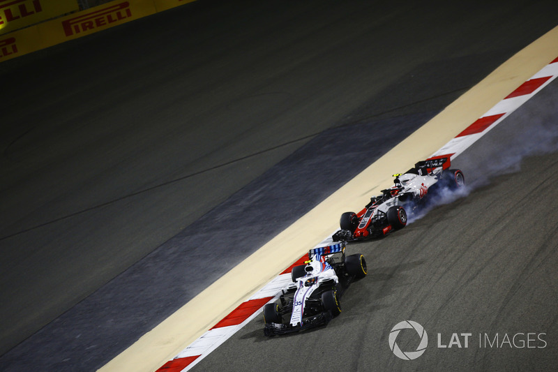 Sergey Sirotkin, Williams FW41 Mercedes, leads Kevin Magnussen, Haas F1 Team VF-18 Ferrari