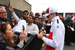 Charles Leclerc, Sauber signs autographs for the fans