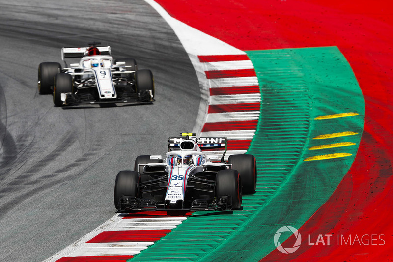 Sergey Sirotkin, Williams FW41, leads Marcus Ericsson, Sauber C37
