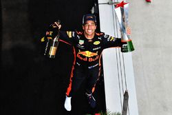 Race winner Daniel Ricciardo, Red Bull Racing celebrates on the podium with the trophy