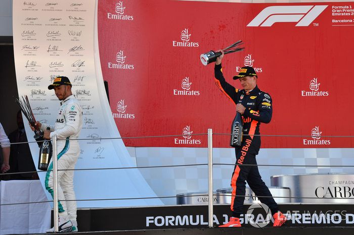 Lewis Hamilton, Mercedes-AMG F1 and Max Verstappen, Red Bull Racing celebrate on the podium