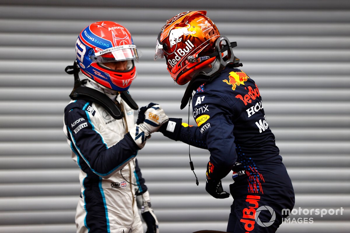 Front row starters George Russell, Williams, and pole man Max Verstappen, Red Bull Racing, celebrate in Parc Ferme