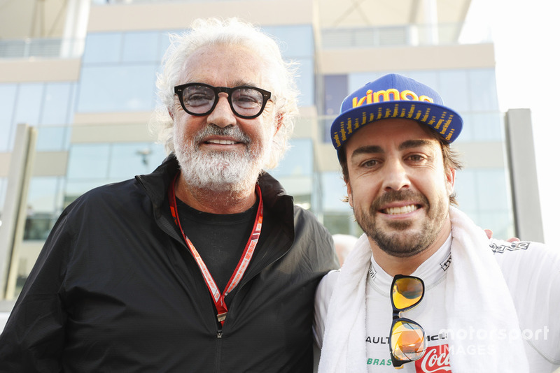 Fernando Alonso, McLaren, with Flavio Briatore on the grid