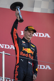 Max Verstappen, Red Bull Racing celebrates with the trophy on the podium