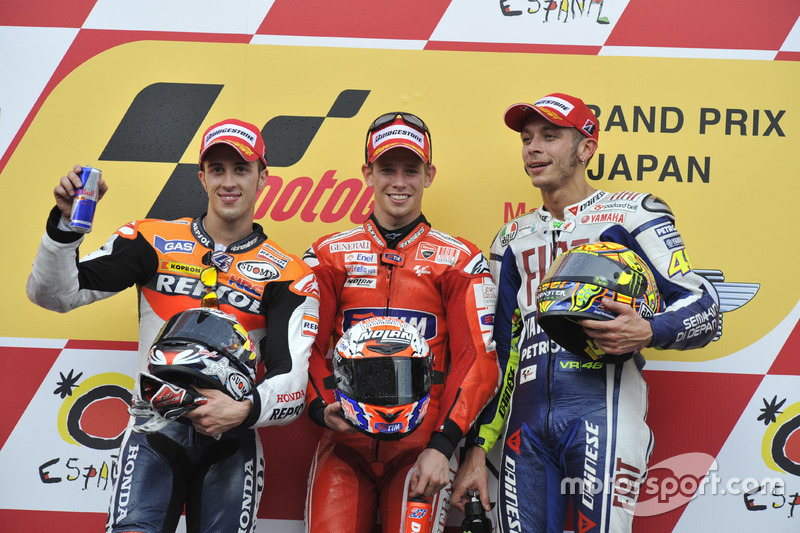 Podium: Race winner Casey Stoner, Ducati; second place Andrea Dovizioso; Repsol Honda; third place V