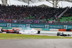 Lewis Hamilton, Mercedes AMG F1 W07 Hybrid leads at the start of the race as Nico Rosberg, Mercedes