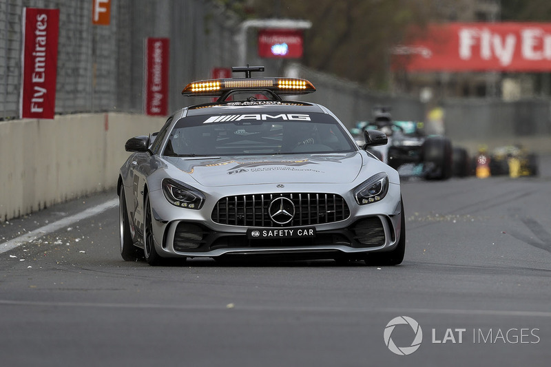 Safety car leads the field