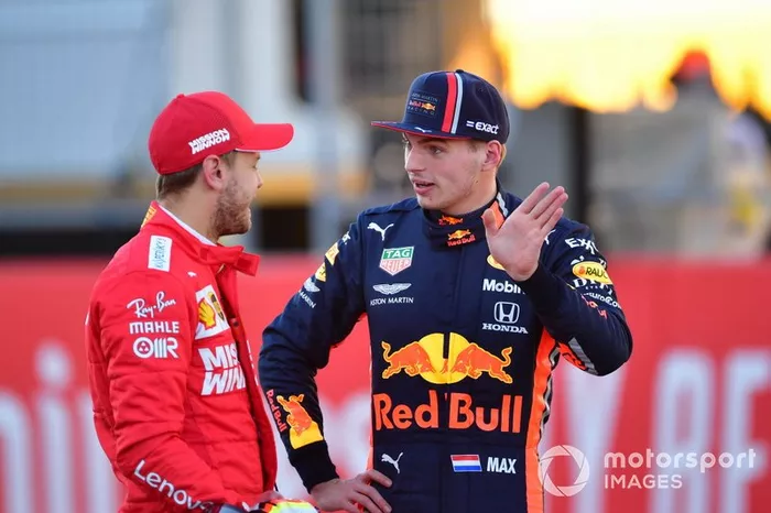 Sebastian Vettel, Ferrari con Max Verstappen, Red Bull Racing