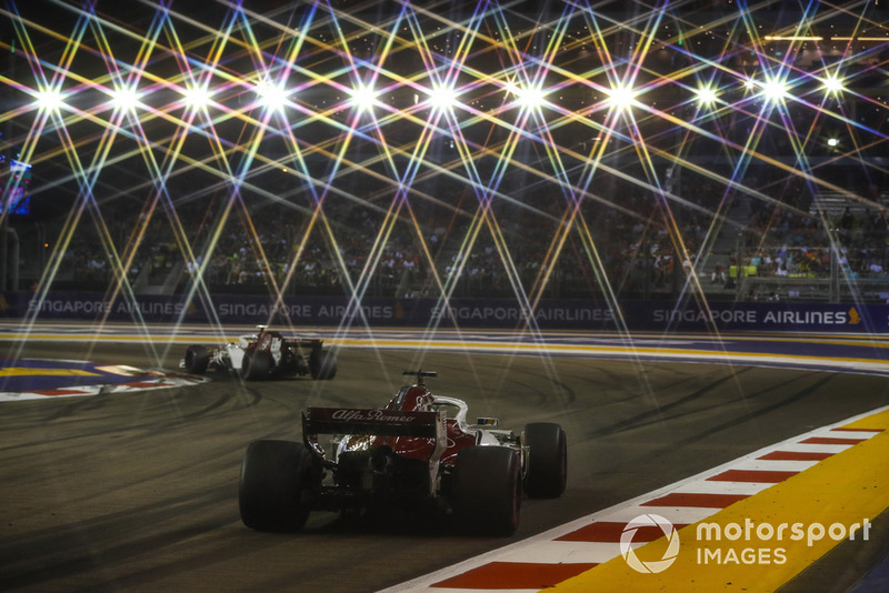 Charles Leclerc, Sauber C37, leads Marcus Ericsson, Sauber C37