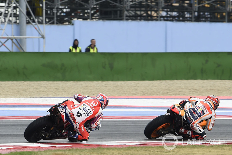 Marc Marquez, Repsol Honda Team overtakes Danilo Petrucci, Pramac Racing