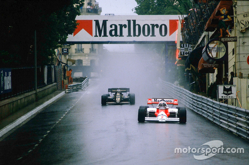 Alain Prost, McLaren MP4\2 TAG Porsche, at Mirabeau, followed by Nigel Mansell, Lotus 95T Renault