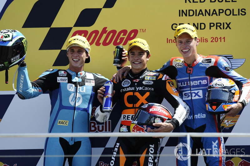 Podio: segundo lugar Pol Espargaró, ganador de la carrera Marc Márquez, tercer lugar Tito Rabat