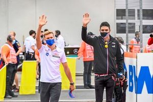 Mick Schumacher, Haas F1, and Esteban Ocon, Alpine F1, at the drivers parade