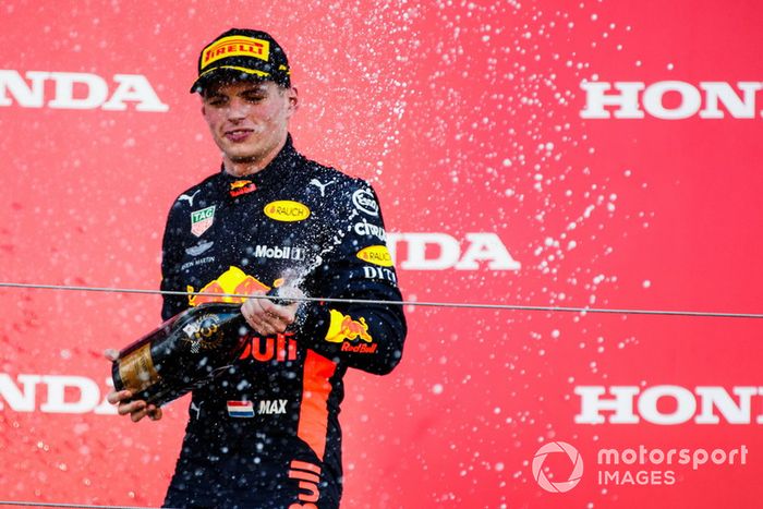 Third place Max Verstappen, Red Bull Racing, sprays Champagne on the podium 