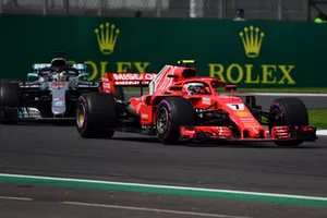 Kimi Raikkonen, Ferrari SF71H leads Lewis Hamilton, Mercedes AMG F1 W09 EQ Power+ 