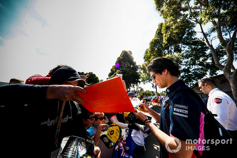 Lance Stroll, Racing Point signs autographs for fans