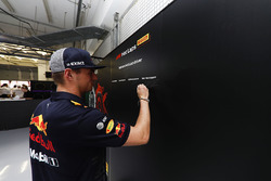 Max Verstappen, Red Bull Racing, signs the Pirelli hot laps board