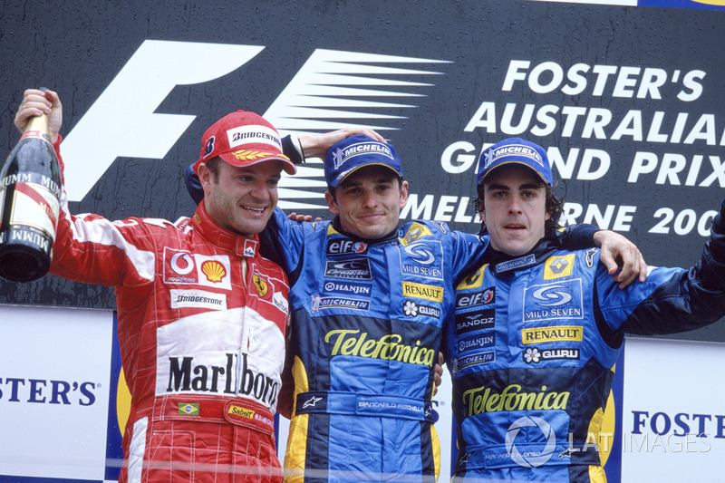 Podium: le vainqueur, Giancarlo Fisichella, Renault F1 Team, le deuxième Rubens Barrichello, Ferrari.