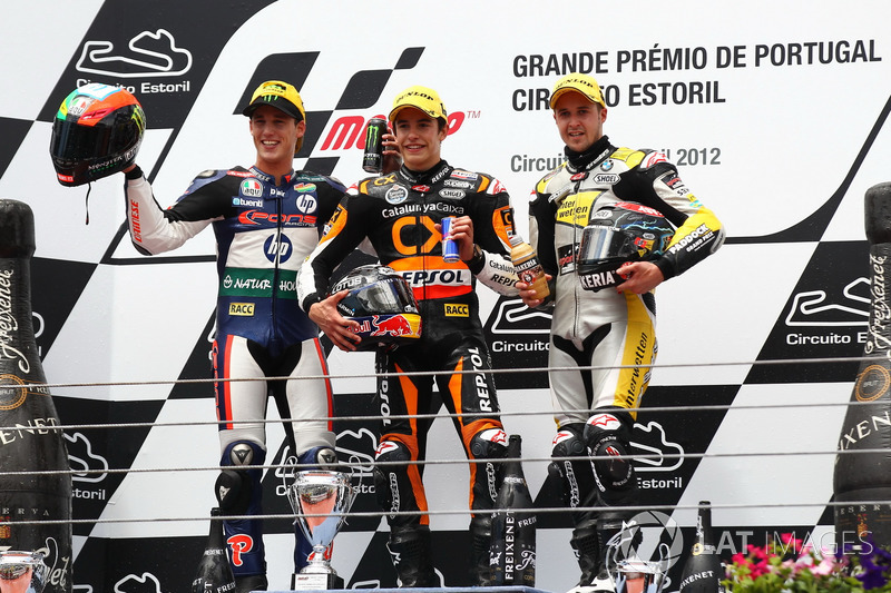 Podio: segundo lugar Pol Espargaró, ganador de la carrera Marc Márquez, tercer lugar Thomas Luthi