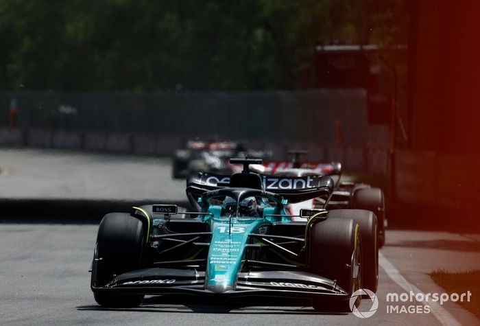 Lance Stroll, Aston Martin AMR23, Kevin Magnussen, Haas VF-23