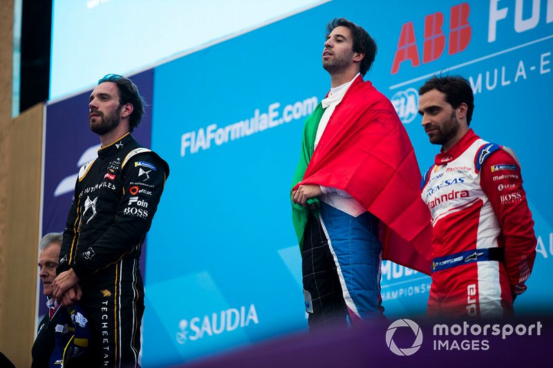 Winner Antonio Felix da Costa, BMW I Andretti Motorsports listens to his national anthem play alongside second position Jean-Eric Vergne, DS TECHEETAH, third position Jérôme d'Ambrosio, Mahindra Racing