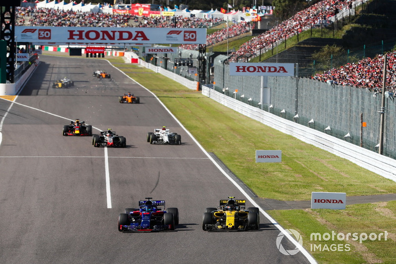 Brendon Hartley, Toro Rosso STR13, bataille avec Carlos Sainz Jr., Renault Sport F1 Team R.S. 18, devant Kevin Magnussen, Haas F1 Team VF-18, Charles Leclerc, Sauber C37, et Daniel Ricciardo, Red Bull Racing RB14