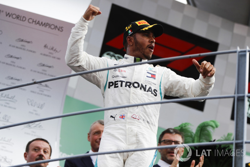 Winner Lewis Hamilton, Mercedes AMG F1, celebrates on the podium