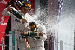 Podium: Race winner Hamilton, Mercedes AMG F1 W07 and second place Nico Rosberg, Mercedes AMG Petronas F1 W07 celevarte with champagne