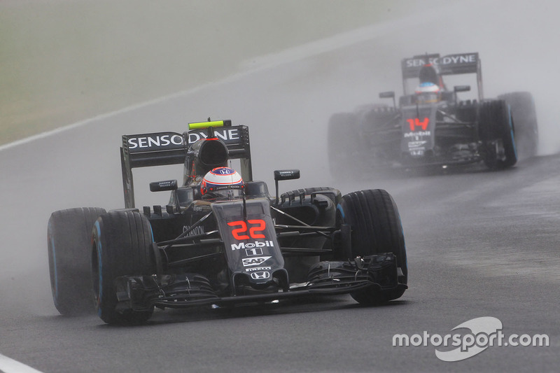 Jenson Button, McLaren MP4-31 leads team mate Fernando Alonso, McLaren MP4-31