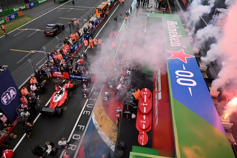Charles Leclerc, Ferrari; Lando Norris, McLaren; George Russell, Mercedes