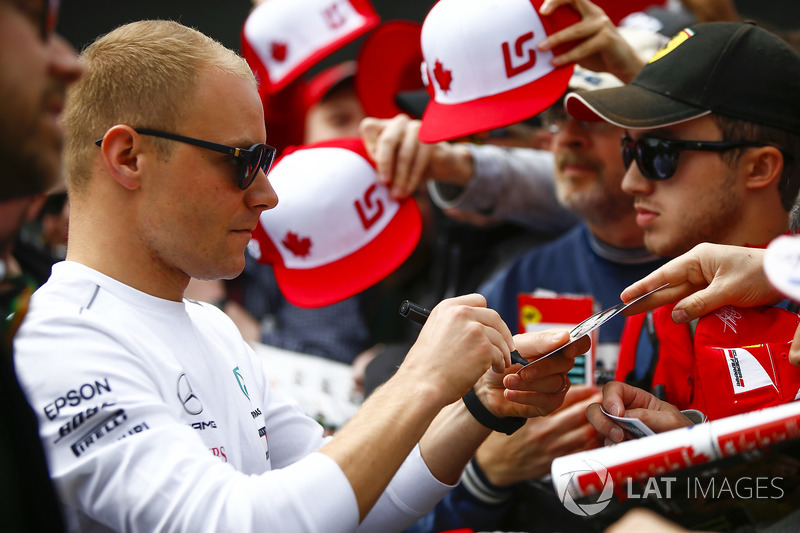 Valtteri Bottas, Mercedes AMG F1, signs autographs for fans