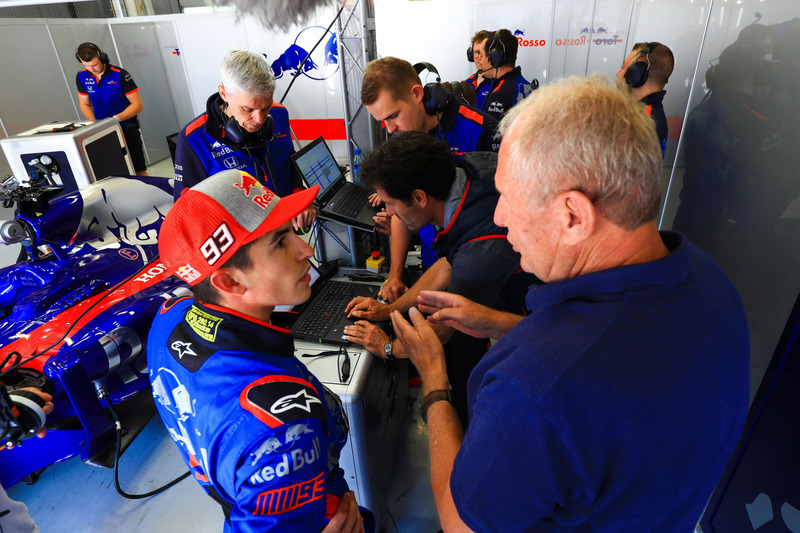 Marc Marquez, tests the Toro Rosso F1 car, with ex Formula 1 driver, Mark Webber