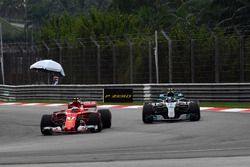 Kimi Raikkonen, Ferrari SF70H and Valtteri Bottas, Mercedes-Benz F1 W08